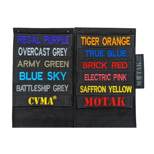 TactiTether black pouches with various embroidered name tapes in different colors, including Regal Purple, Overcast Grey, Army Green, Blue Sky, Battleship Grey, CVMA, Tiger Orange, True Blue, Brick Red, Electric Pink, Saffron Yellow, and MOTAK.
