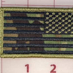 Camo American flag patch with green border and camouflage pattern on a gridded background.