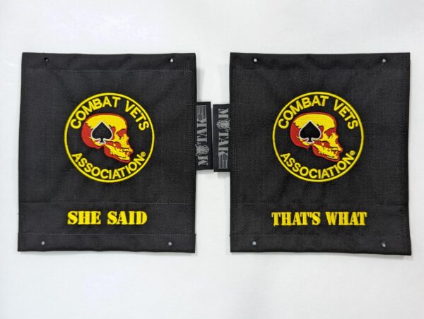 Set of two black panels with Combat Vets Association patches, one with "SHE SAID" and the other with "THAT'S WHAT" in yellow text.
